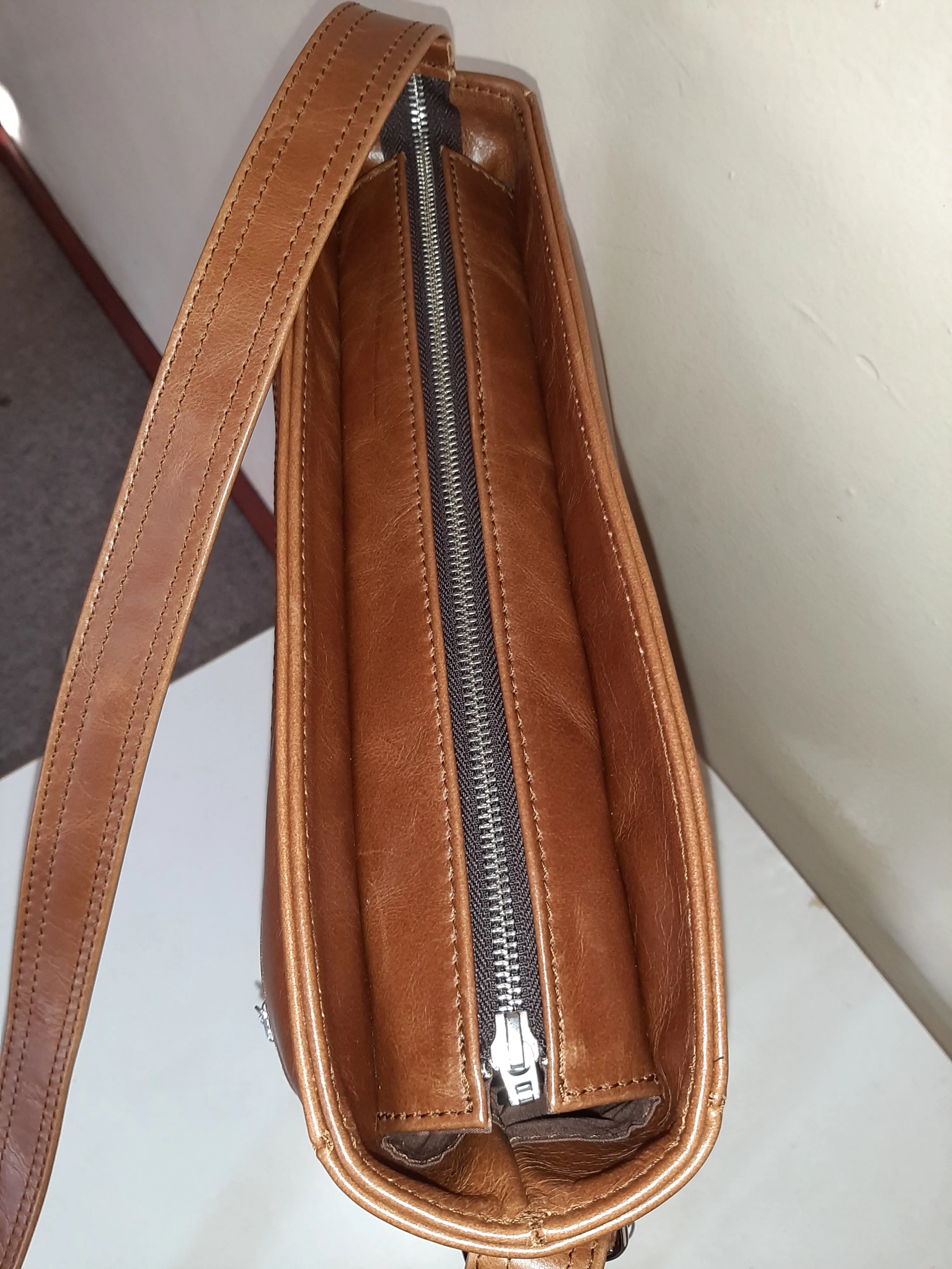 Lizzy leather sling bags