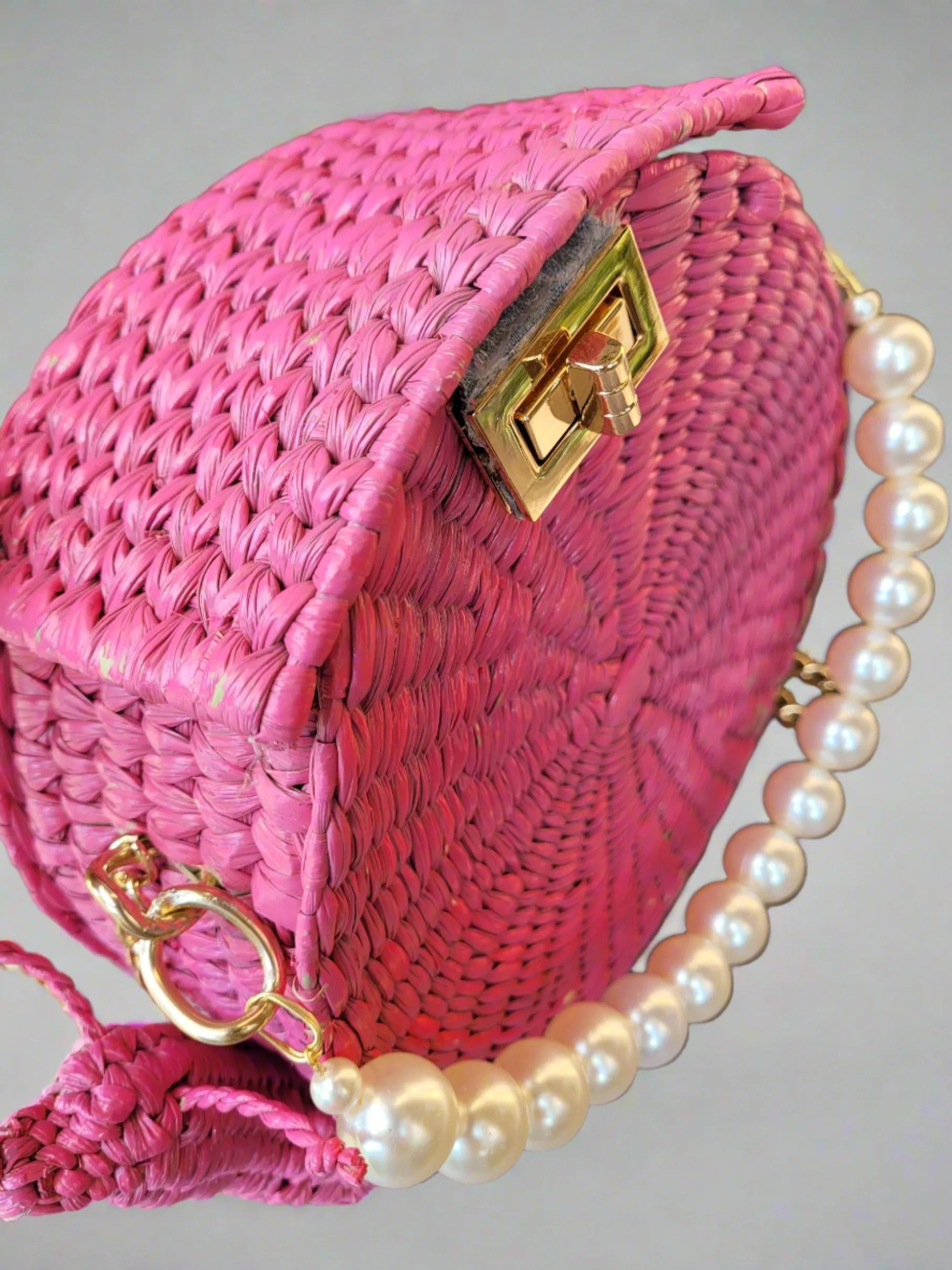 Pink snail palm purse